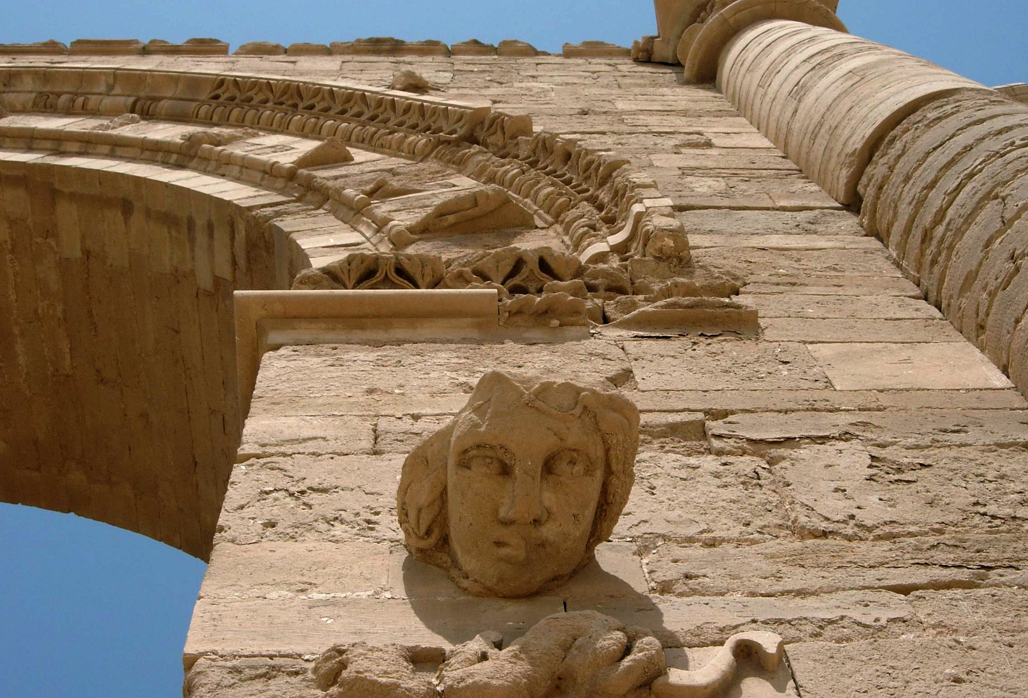 PHOTO: In this July 27, 2005 file photo, the face of a woman stares down at visitors in the Hatra ruins, 320 kilometers (200 miles) north of Baghdad, Iraq. 
