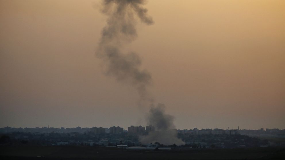 Smoke rises following an Israeli strike on Gaza, seen from the Israel-Gaza border, Saturday, July 12, 2014.
