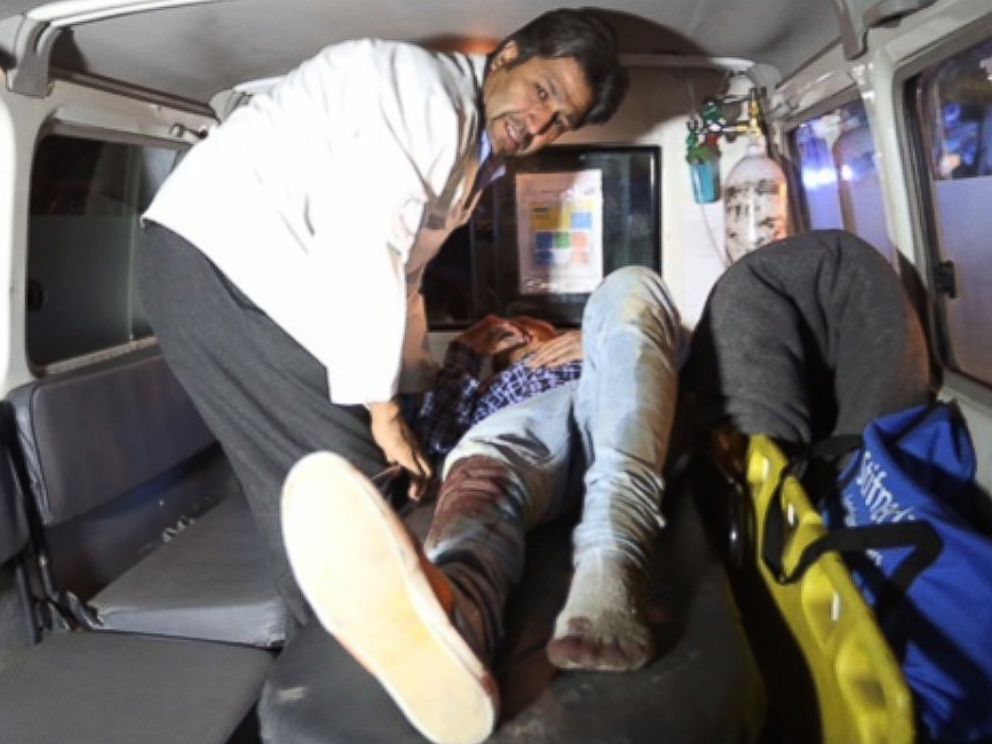 PHOTO: A wounded person is treated in an ambulance after an attack on the campus of the American University in the Afghan capital Kabul on Aug. 24, 2016.