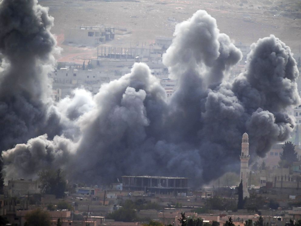 PHOTO: Thick smoke rises following an airstrike by the US-led coalition in Kobani, Syria as fighting continued between Syrian Kurds and the militants of Islamic State group, as seen from Mursitpinar Turkey-Syria border, Oct. 13, 2014.