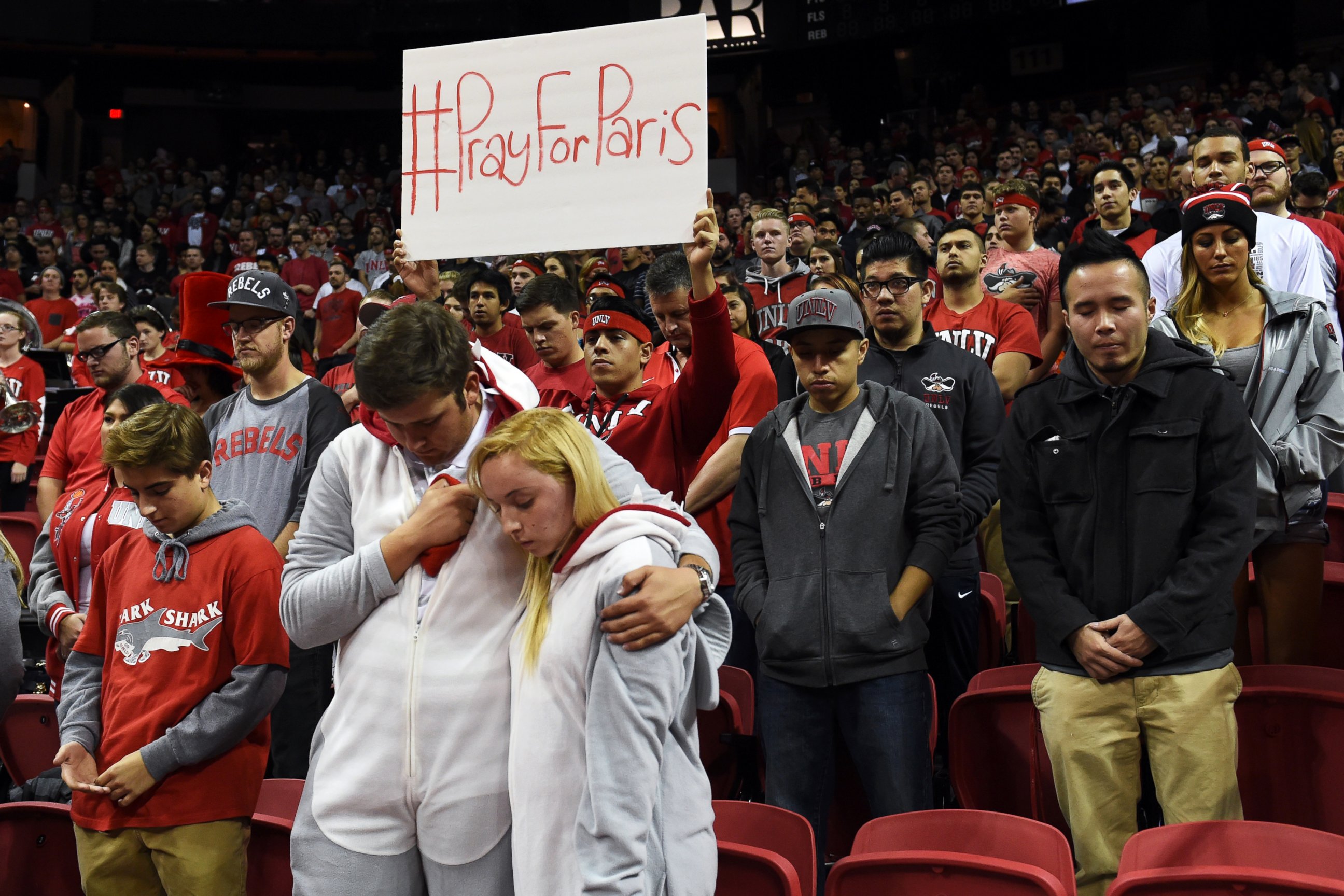 PHOTO: UNLV fans observe a moment of silence for the victims of the terrorist attacks in Paris on Nov. 13, 2015, before UNLV's basketball game against Cal Poly at the Thomas & Mack Center in Las Vegas.