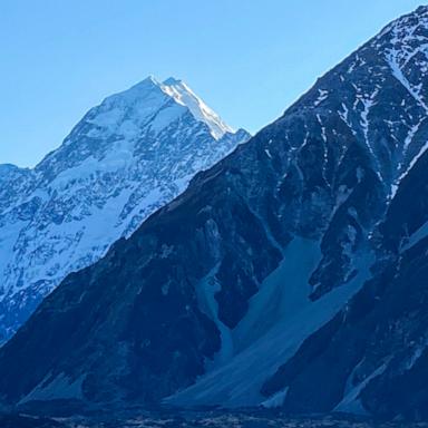 The search for the climbers is delayed because of bad weather.