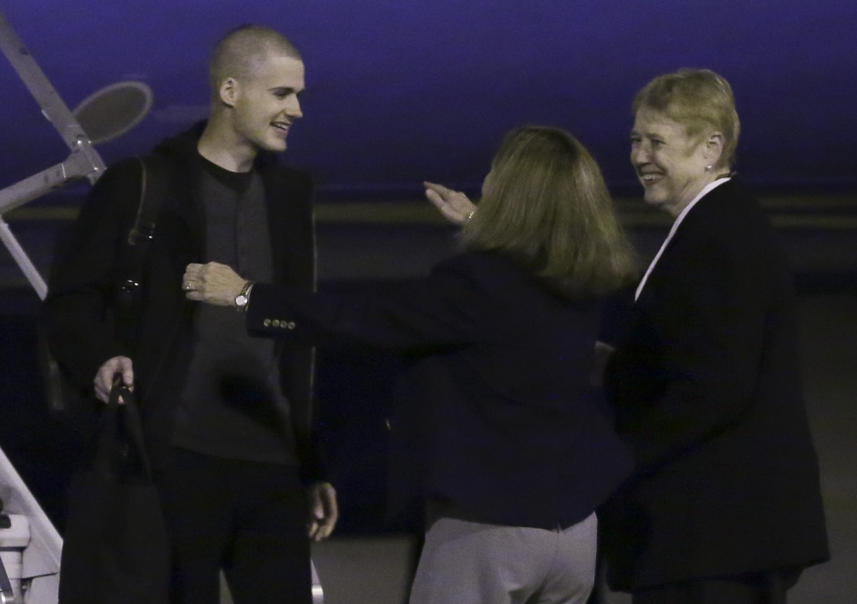 PHOTO: Matthew Miller, who had been held in North Korea since April, 2014, is greeted after arriving Saturday, Nov. 8, 2014, at Joint Base Lewis-McChord, Wash.