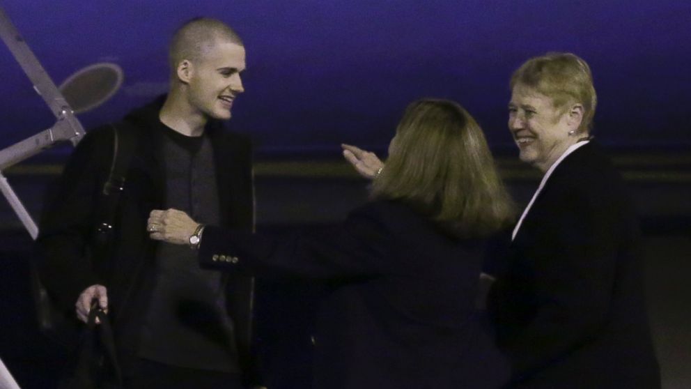 PHOTO: Matthew Miller, who had been held in North Korea since April, 2014, is greeted after arriving Saturday, Nov. 8, 2014, at Joint Base Lewis-McChord, Wash.