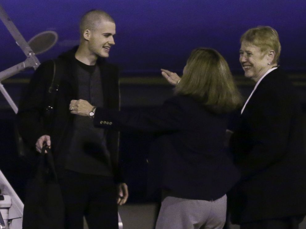 PHOTO: Matthew Miller, who had been held in North Korea since April, 2014, is greeted after arriving Saturday, Nov. 8, 2014, at Joint Base Lewis-McChord, Wash.
