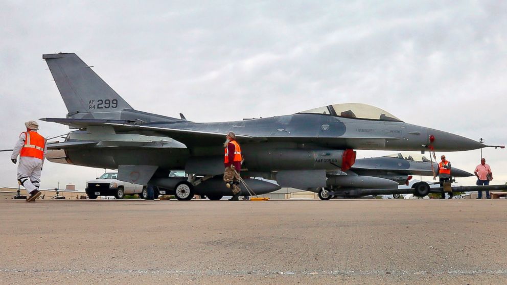 In this May 15, 2015, file photo, a boneyard crew tows an F-16 Fighting Falcon aircraft prior at Davis-Monthan Air Force Base in Tucson, Ariz. Military officials confirm a single F-16 Fighting Falcon aircraft crashed Wednesday night, June 24, 2015, about 5 miles east of Douglas Municipal Airport.
