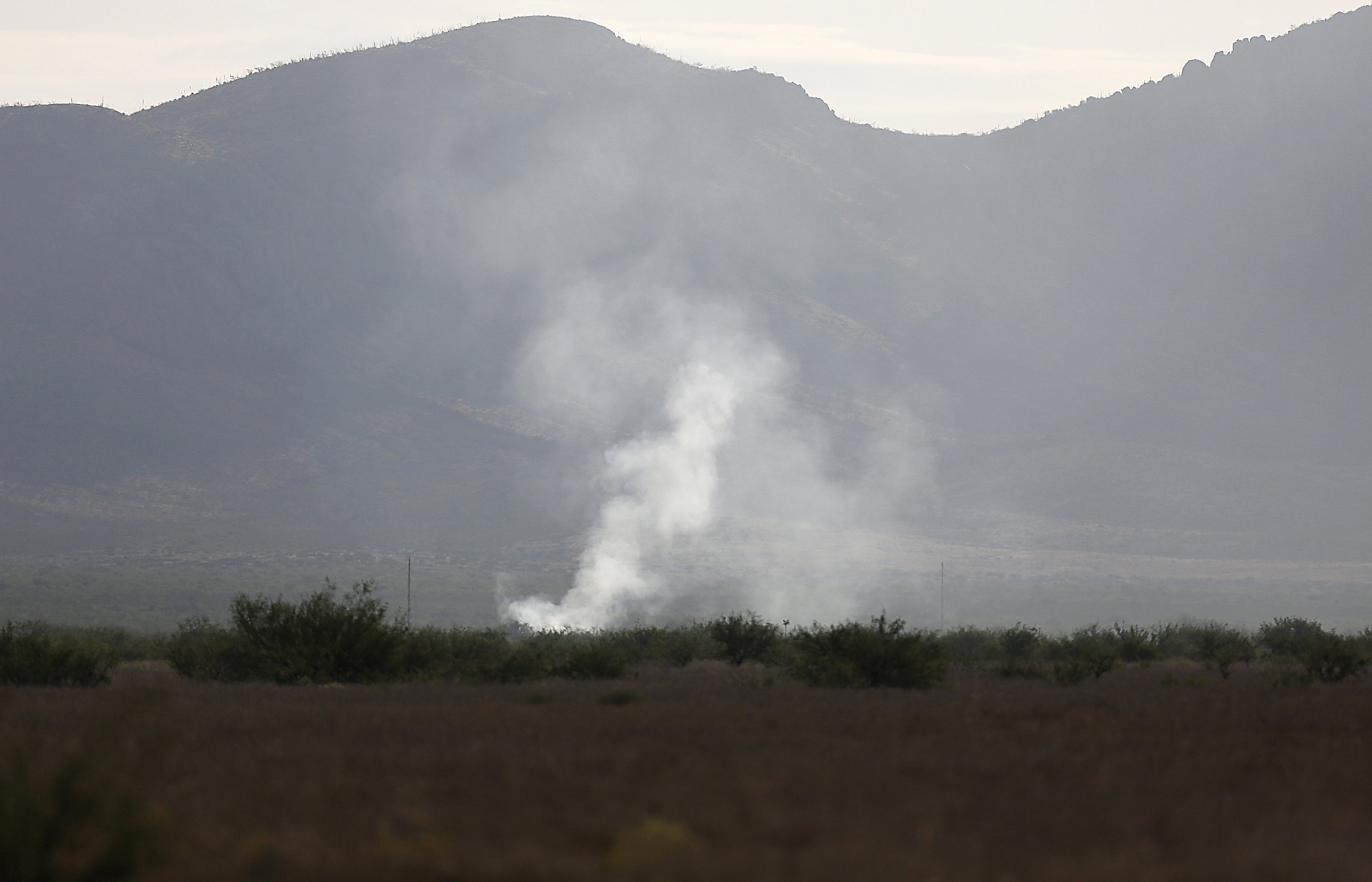 PHOTO: Smoke rises Thursday, June 25, 2015, from the site where an F-16 Fighting Falcon crashed Wednesday evening near Douglas, Ariz.