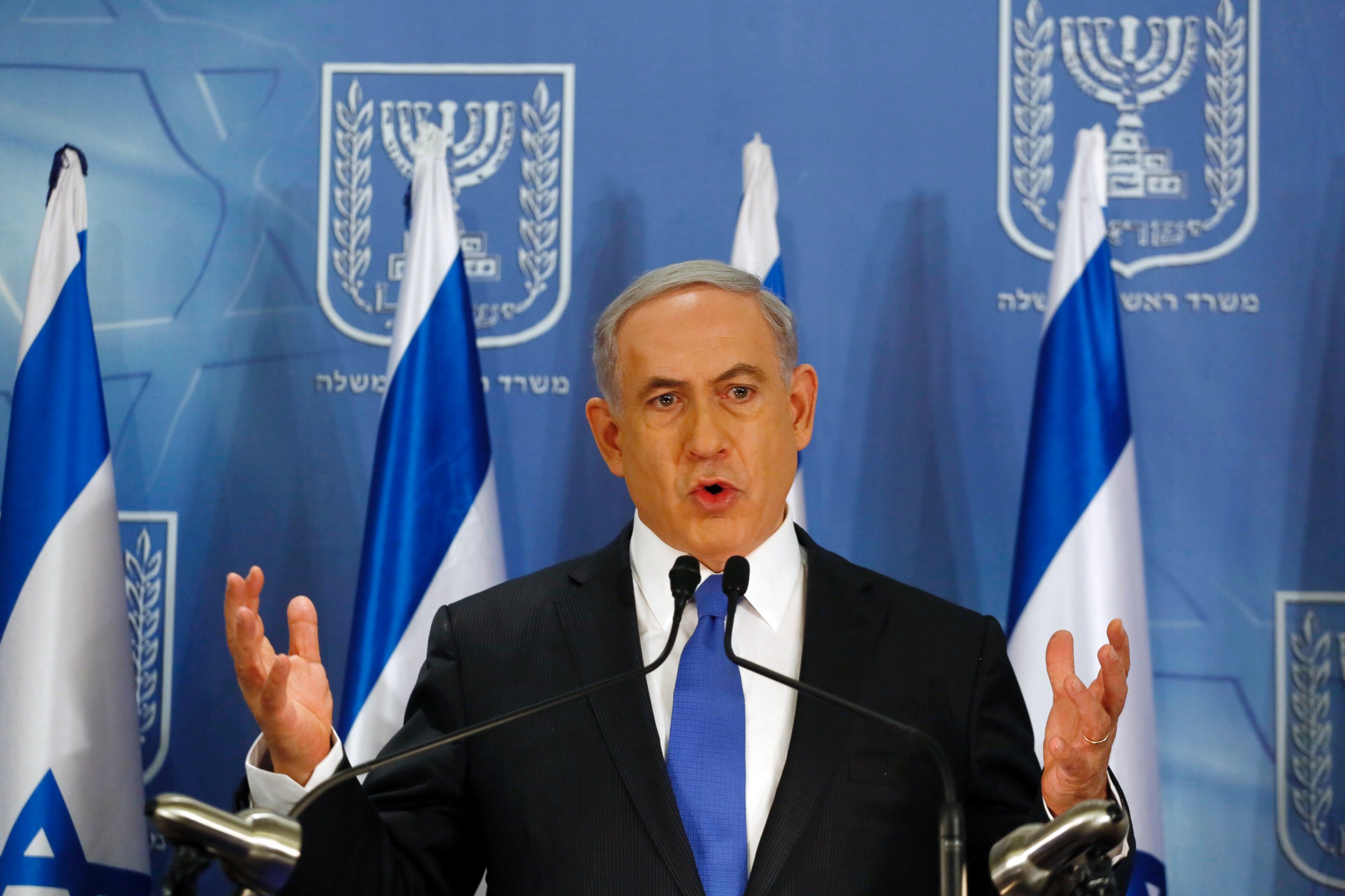 PHOTO: Israeli Prime Minister Benjamin Netanyahu gestures as he speaks during a press conference at the defense ministry in the Israeli coastal city of Tel Aviv on July 11, 2014. 