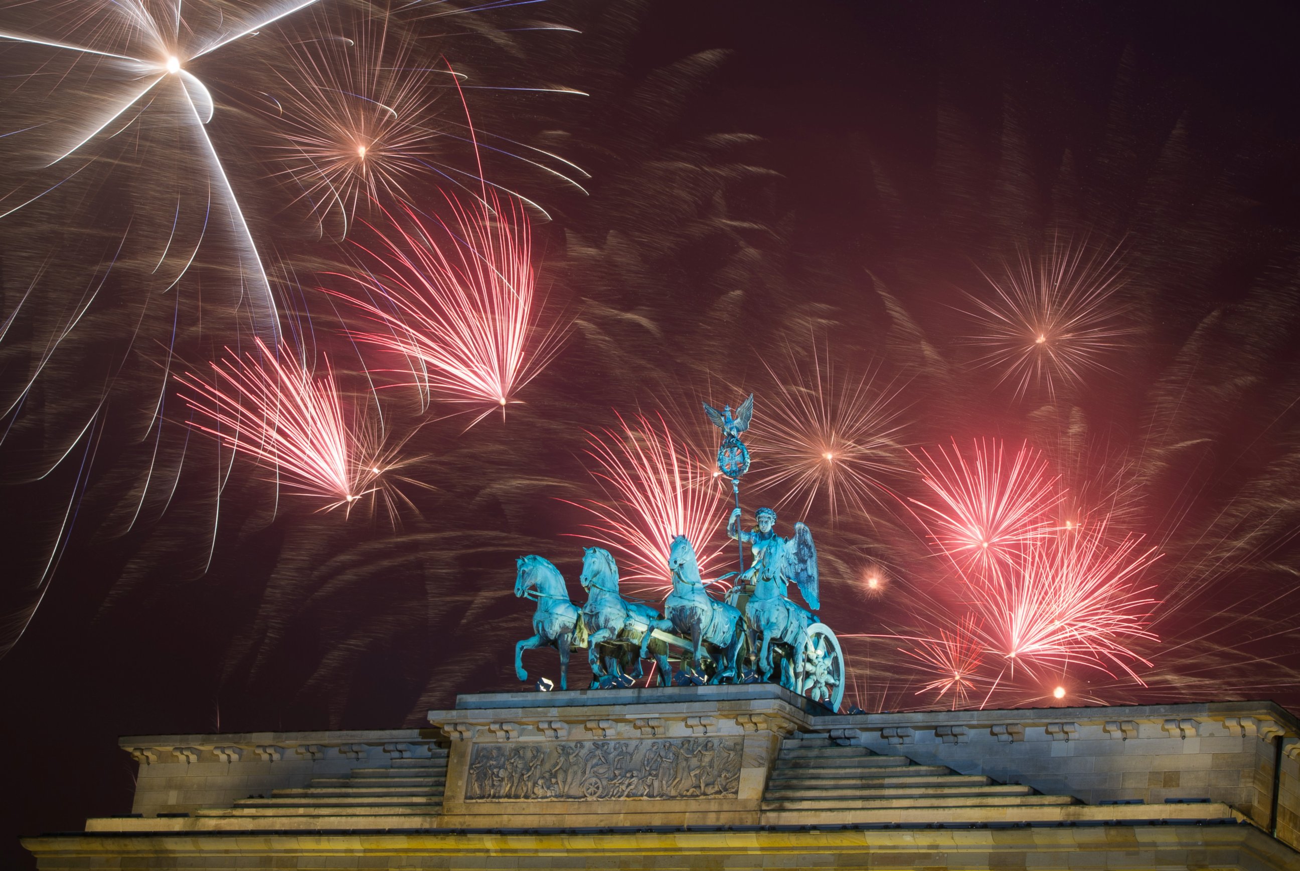 PHOTO: Fireworks explode during the New Year's party at Brandenburg Gate in Berlin, Jan. 1, 2015. 