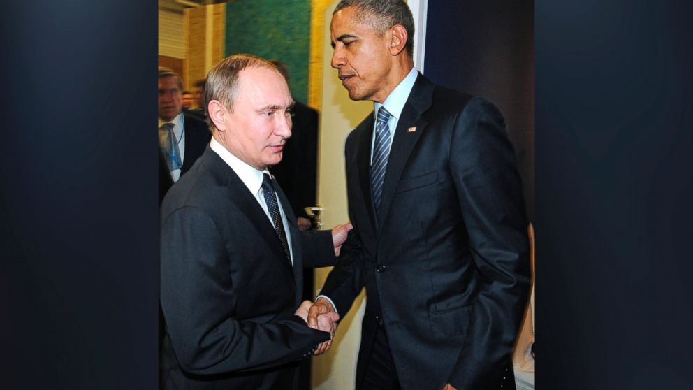 Russian President Vladimir Putin and U.S. President Barack Obama shake hands at the COP21 UN Conference on Climate Change in Paris, Nov. 30, 2015.