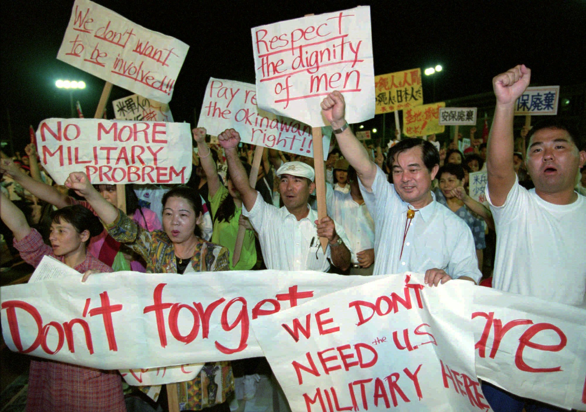 PHOTO: Members of Japanese Teacher's Union demonstrate in Ginowan, Okinawa, Oct. 5, l995.