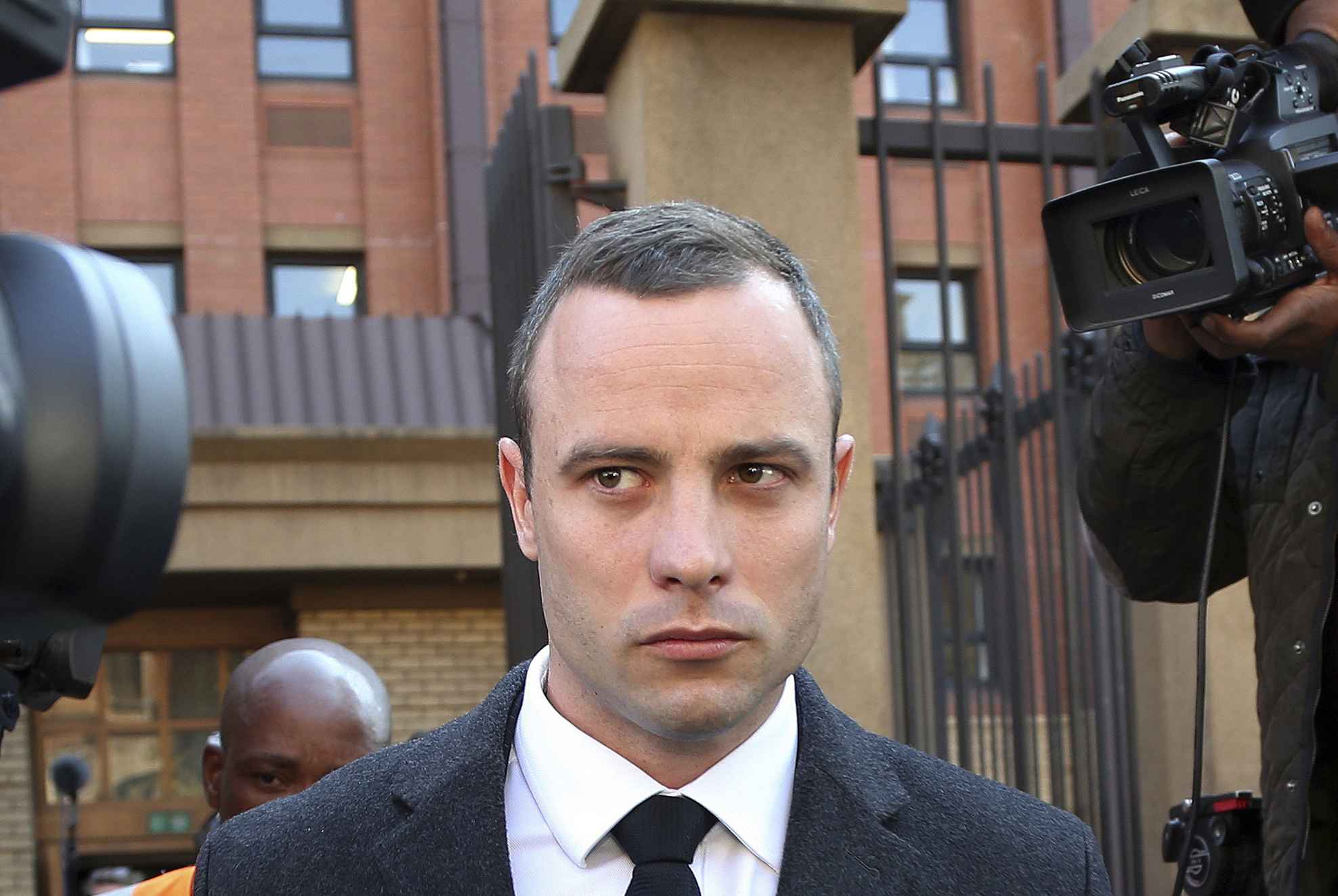 PHOTO: Oscar Pistorius leaves the high court in Pretoria, South Africa on May 20, 2014.