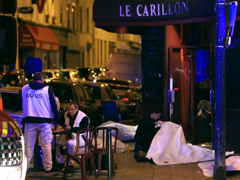 PHOTO: Victims lay on the pavement outside a Paris restaurant, Nov. 13, 2015.