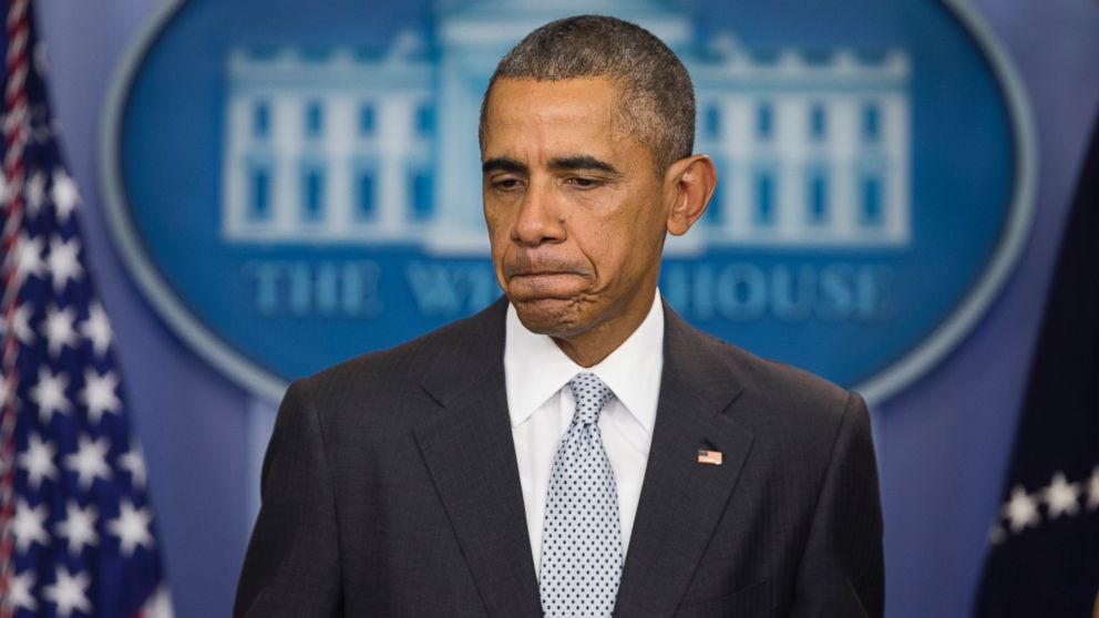 President Barack Obama pauses as he speaks about attacks in Paris from the briefing room of the White House, Nov. 13, 2015, in Washington.