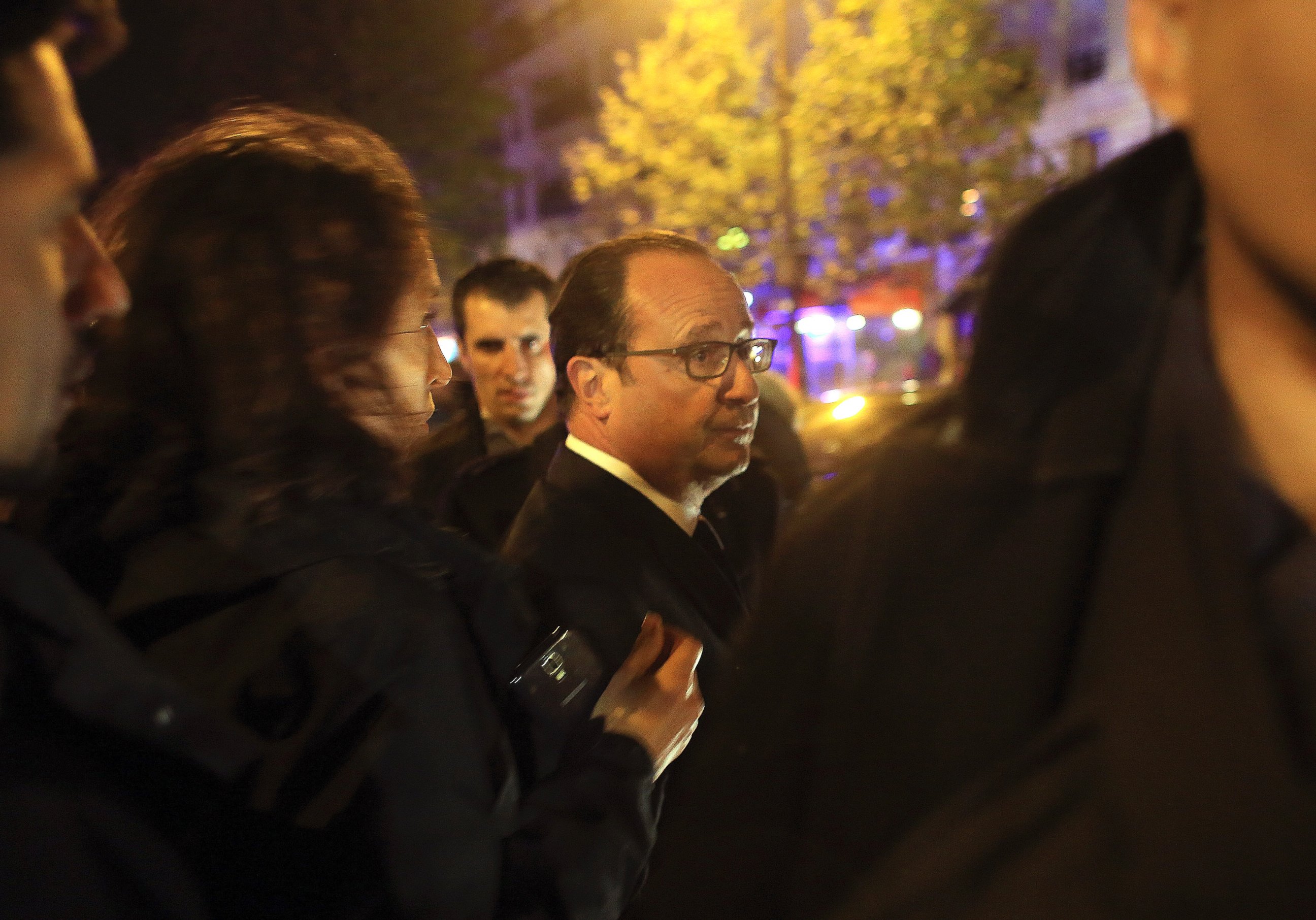 PHOTO: French President Francois Hollande arrives to visit the site of the the Bataclan theater after a shooting in Paris, Nov. 13, 2015.