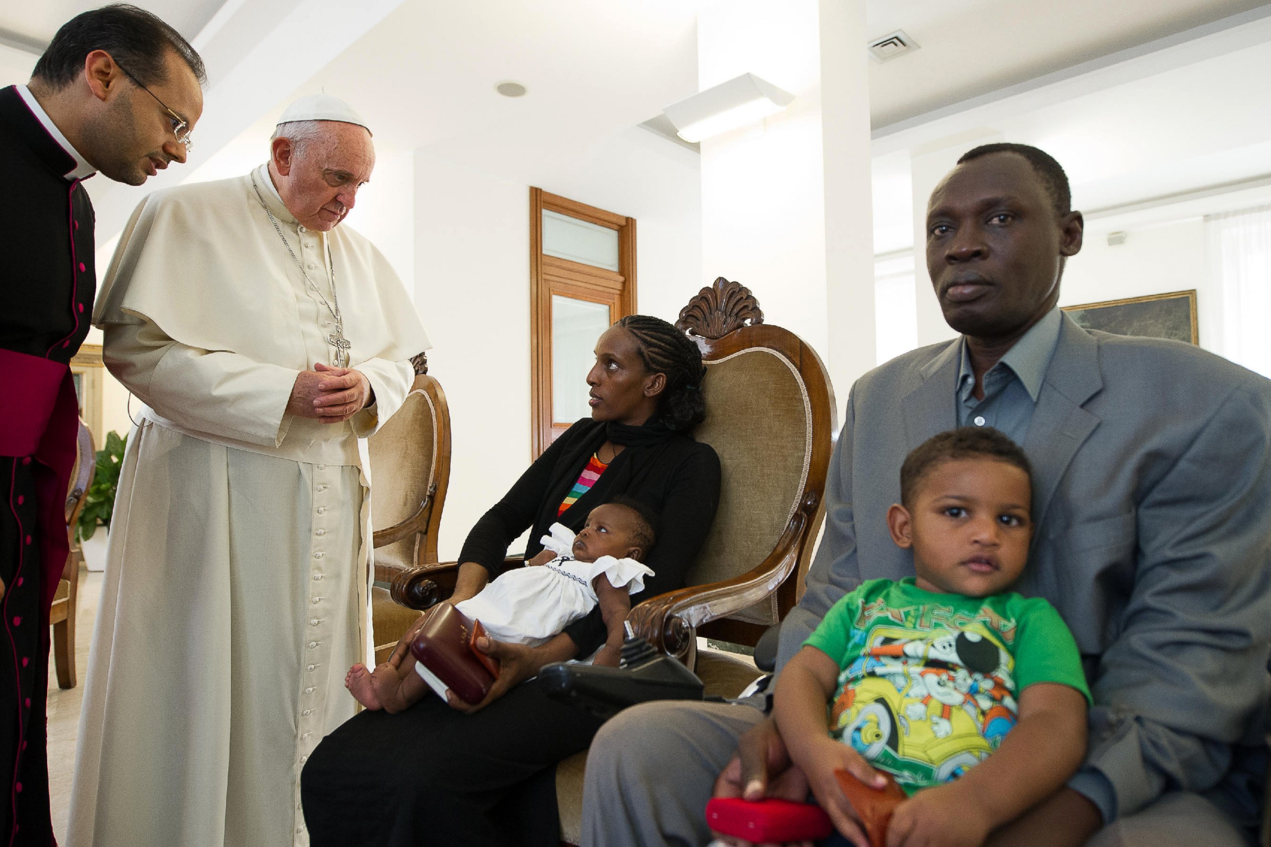 PHOTO: Pope Francis meets Meriam Ibrahim with her husband Daniel Wani and two small children in his Santa Marta residence at the Vatican on July 24, 2014.