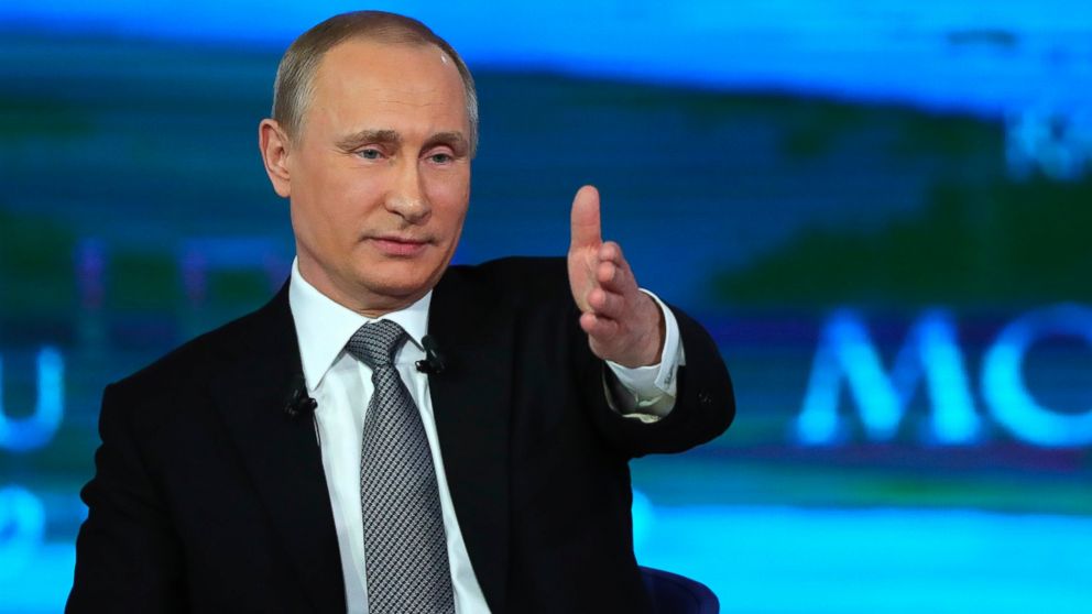 Russian President Vladimir Putin gestures as he answers a question during his annual call-in show in Moscow, Russia, April 14, 2016.