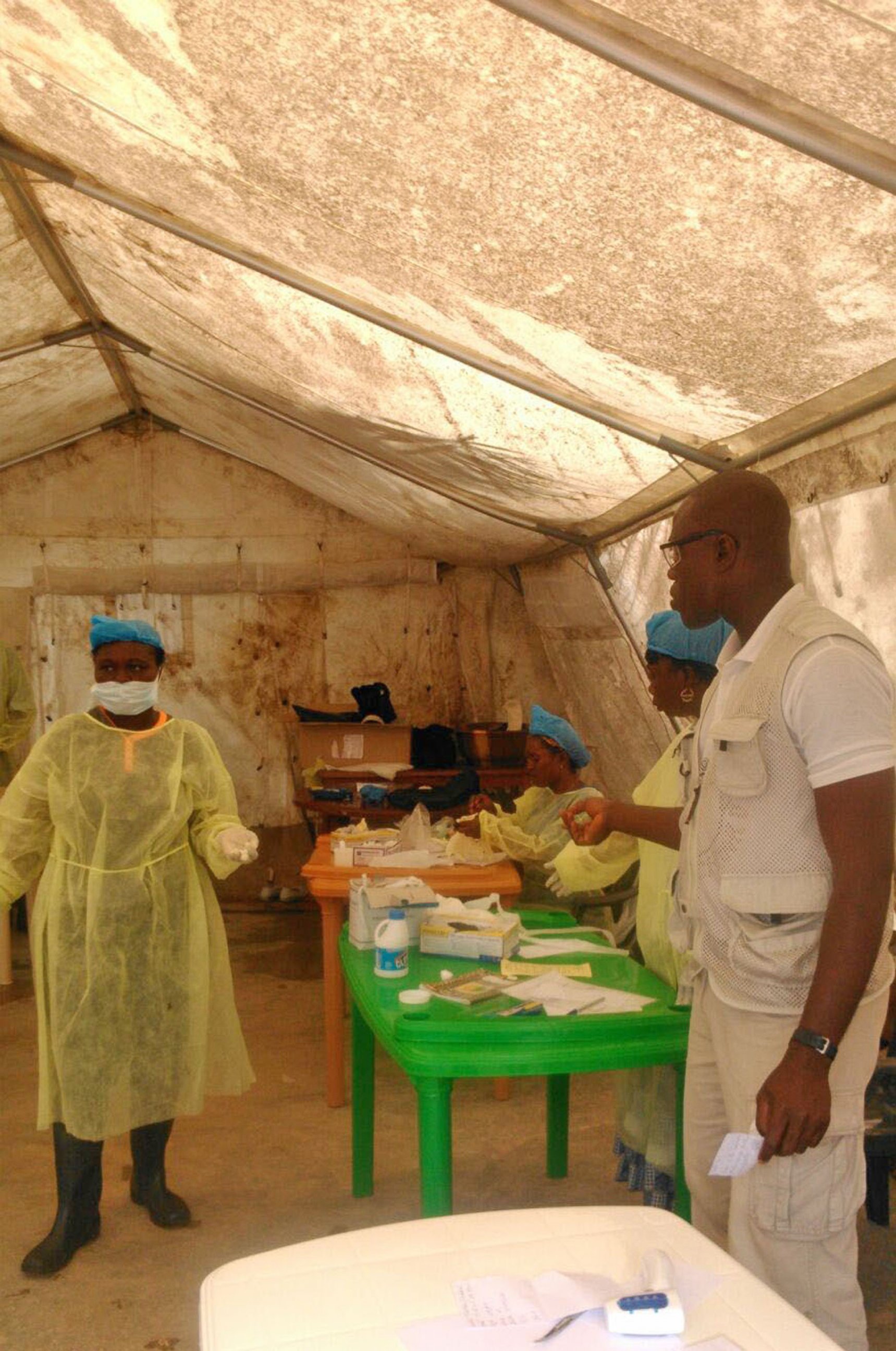 PHOTO: In this photo taken on July 27, 2014,  medical personnel work at the Doctors Without Borders facility in Kailahun, Sierra Leone. 