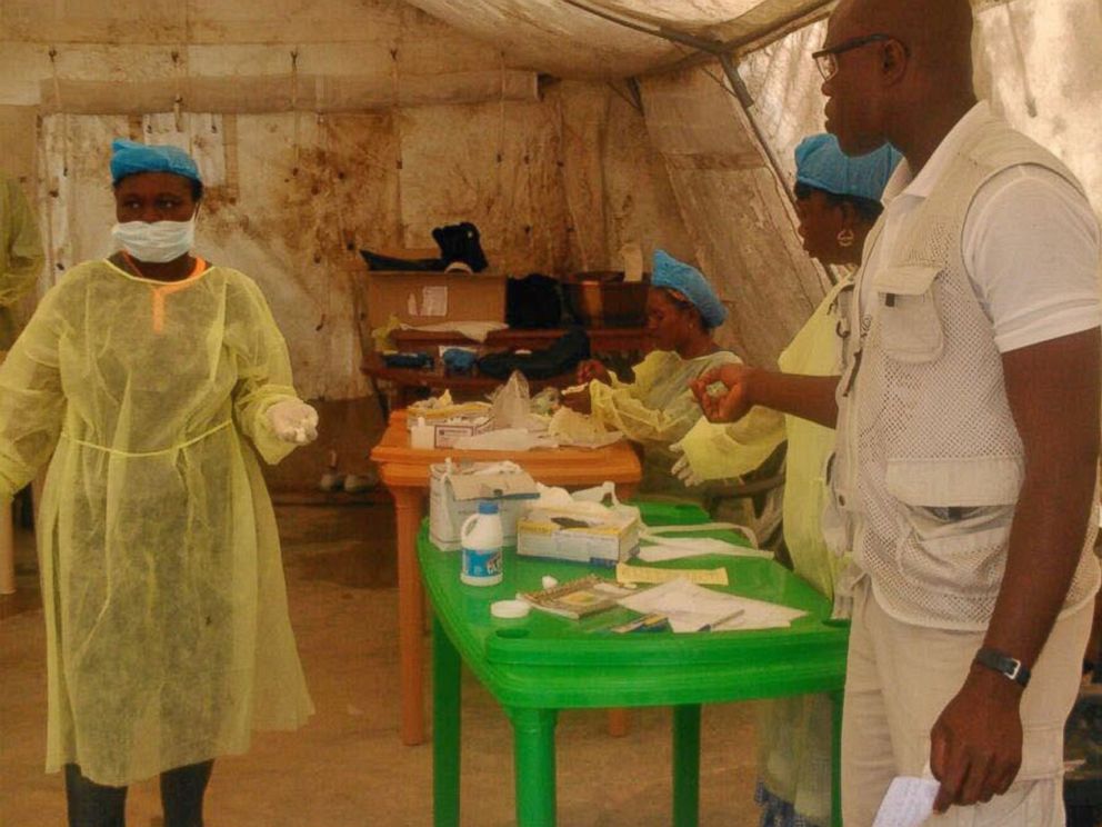 PHOTO: In this photo taken on July 27, 2014, medical personnel work at the Doctors Without Borders facility in Kailahun, Sierra Leone.