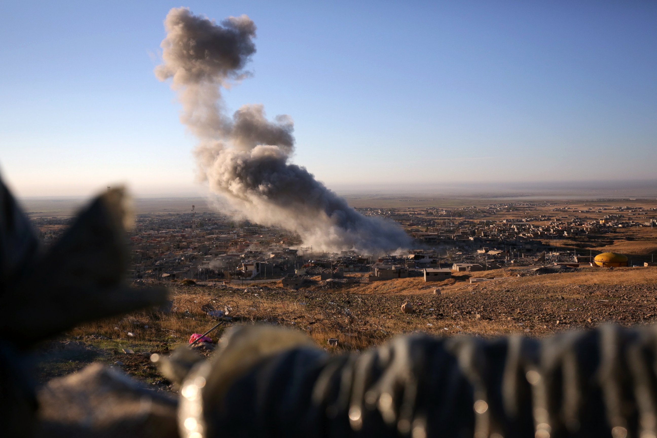 PHOTO: Smoke believed to be from an airstrike billows over the northern Iraqi town of Sinjar on Nov. 12, 2015.