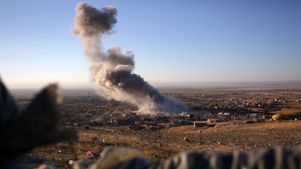 PHOTO: Smoke believed to be from an airstrike billows over the northern Iraqi town of Sinjar on Nov. 12, 2015.