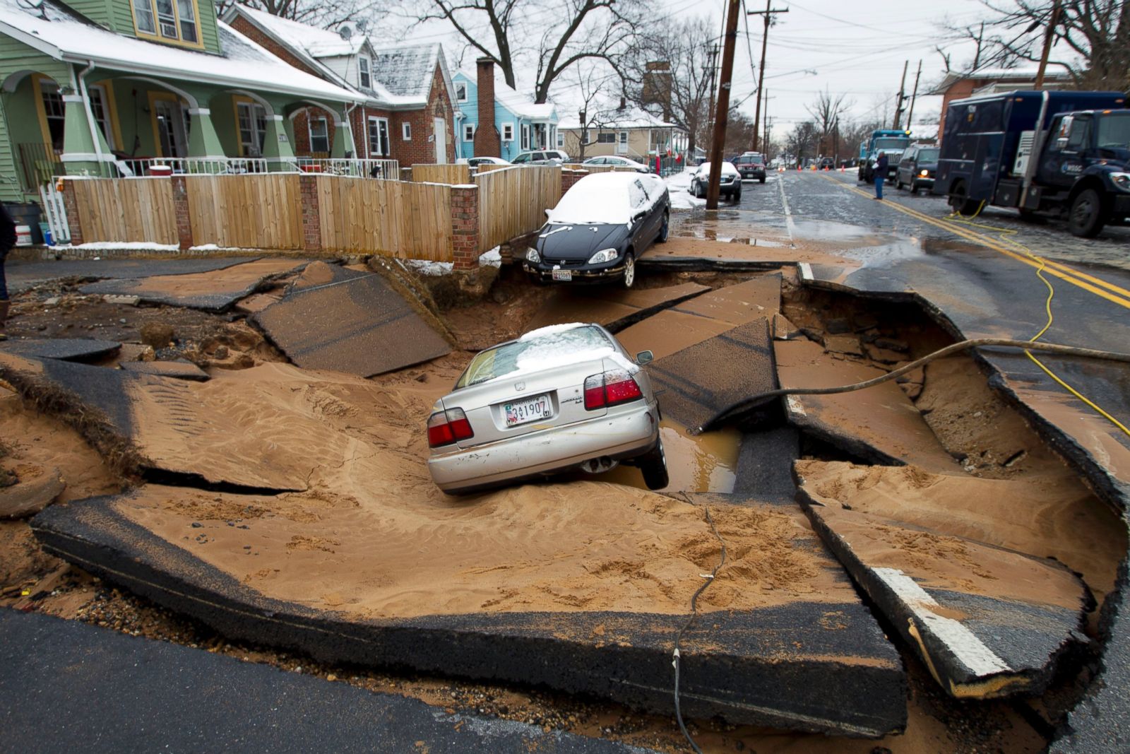 Image result for pics of cars in sinkholes