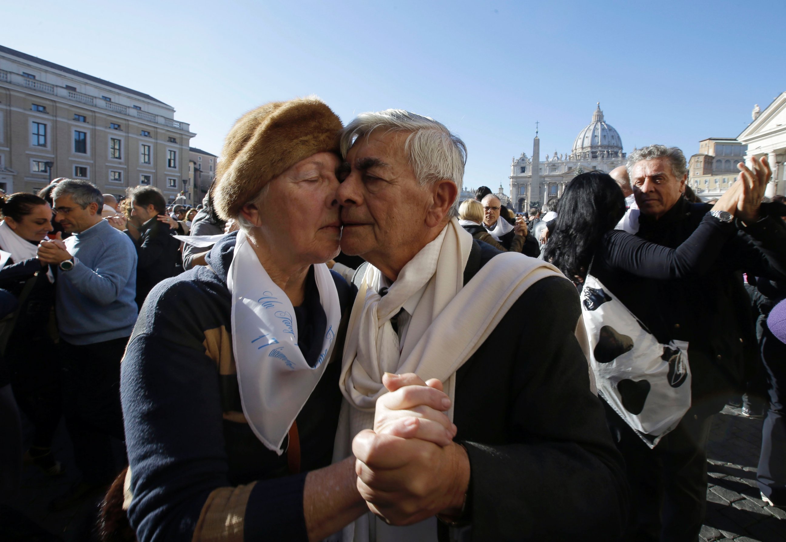 PHOTO: A couple dances tango in front of St. Peter's Square to celebrate Pope Francis 78th birthday, at the Vatican on Dec. 17, 2014.