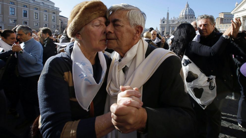 PHOTO: A couple dances tango in front of St. Peter's Square to celebrate Pope Francis 78th birthday, at the Vatican on Dec. 17, 2014.
