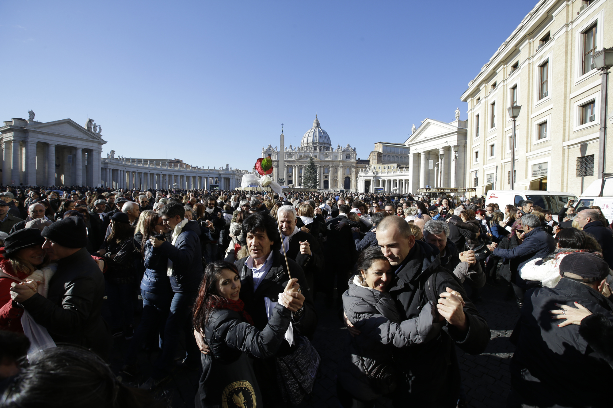 PHOTO: People dance tango in front of St. Peter's Square to celebrate Pope Francis 78th birthday, at the Vatican on Dec. 17, 2014.
