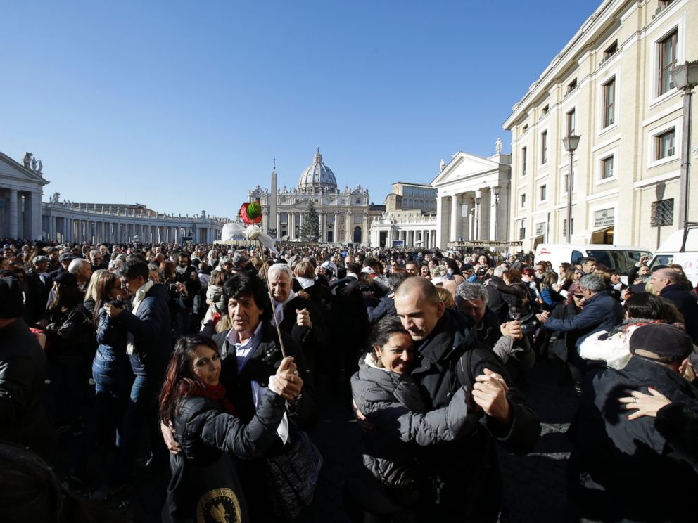 PHOTO: People dance tango in front of St. Peters Square to celebrate Pope Francis 78th birthday, at the Vatican on Dec. 17, 2014.