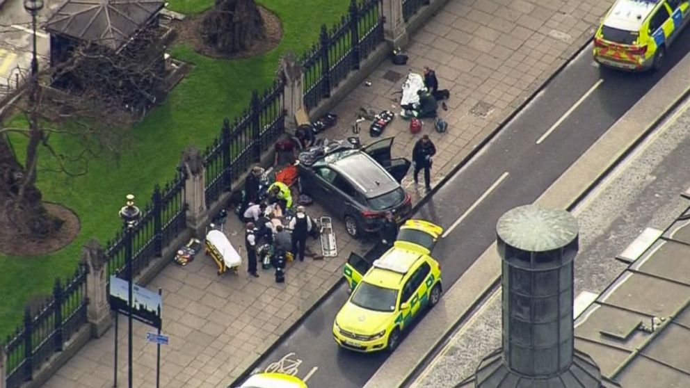 PHOTO: Emergency services workers respond to the scene of an incident near Westminster Bridge and the Houses of Parliament in London on March 22, 2017.