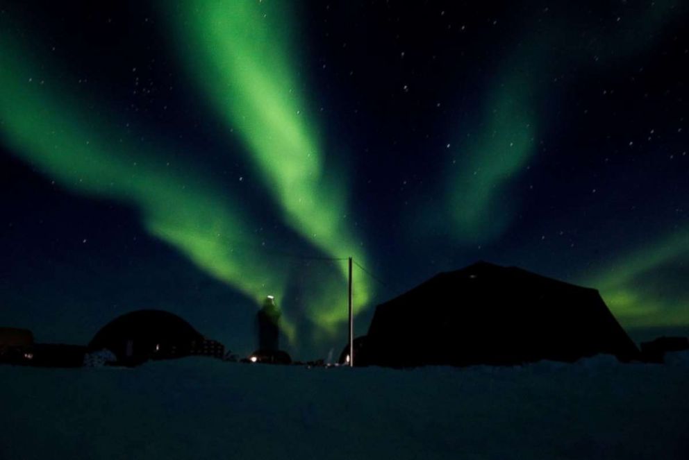 PHOTO: Ice Camp Skate as the aurora borealis displays above camp March 9, 2018 in support of Ice Exercise (ICEX) 2018.