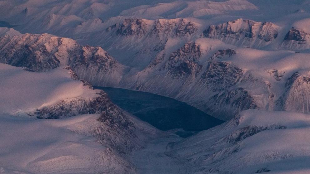 PHOTO: The Arctic tundra from the window of an airplane heading from Iqaluit to Pond Inlet, Nunavut, Canada, Nov. 10, 2021. 