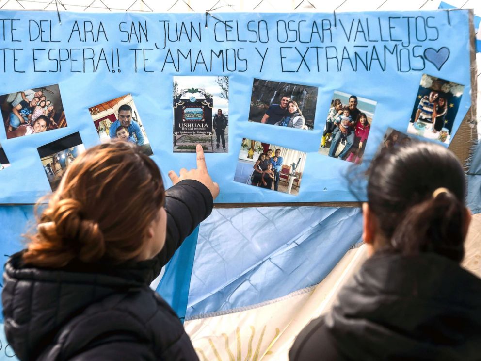 PHOTO: Women look at family pictures of missing Argentine submarine crew member Cesar Oscar Vallejos, hanging outside Argentinas Navy base in Mar del Plata, on the Atlantic coast south of Buenos Aires, on Nov. 24, 2017.
<p itemprop=