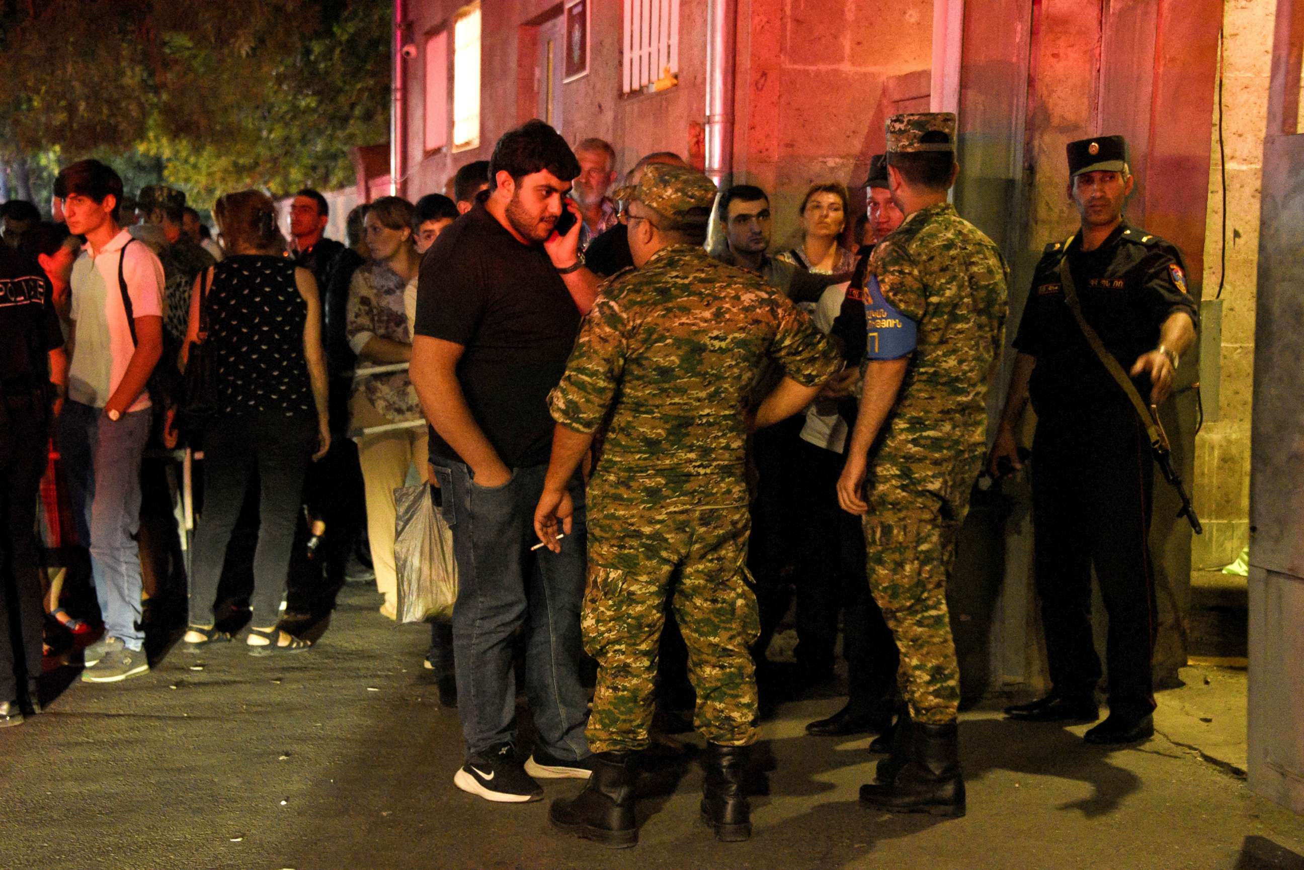 PHOTO: Relatives of servicemen, who were wounded in night border clashes between Armenia and Azerbaijan, gather outside a military hospital in Yerevan, Sept. 13, 2022.