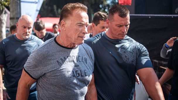 PHOTO: Arnold Schwarzenegger (center) is seen at the Arnold Classic Africa, a multi-sport festival held at the Sandton Convention Centre on May 18, 2019, in Johannesburg.