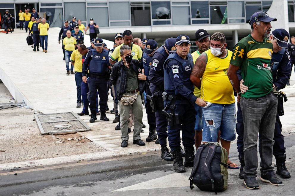 PHOTO: Security forces detain supporters of Brazil's former President Jair Bolsonaro during a demonstration against President Luiz Inacio Lula da Silva, outside Planalto Palace in Brasilia, Brazil, Jan. 8, 2023.
