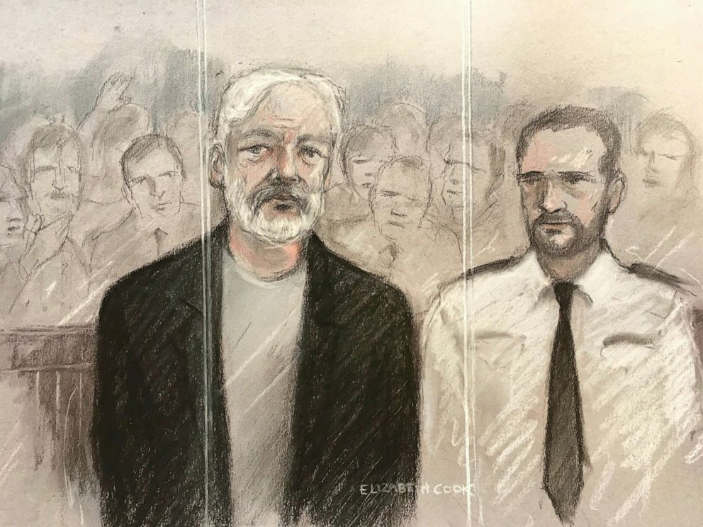 PHOTO: Court artist sketch depicting Julian Assange, left, as he appeared at Southwark Crown Court in London, May 1, 2019.