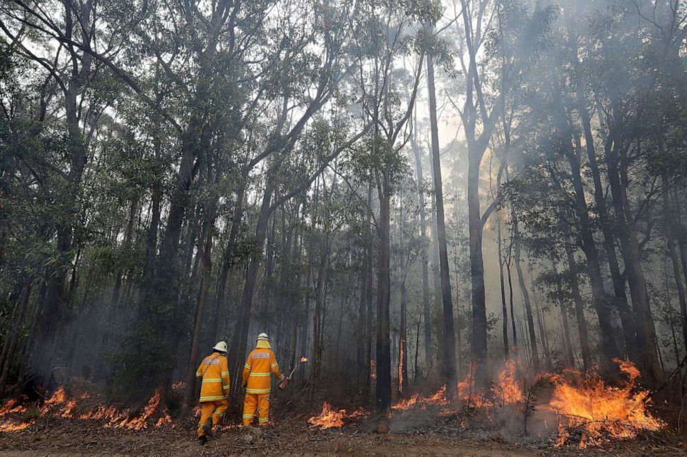 PHOTO:Firefighters manage a controlled burn near Tomerong, Australia, Jan. 8, 2020, in an effort to contain a larger fire nearby. 