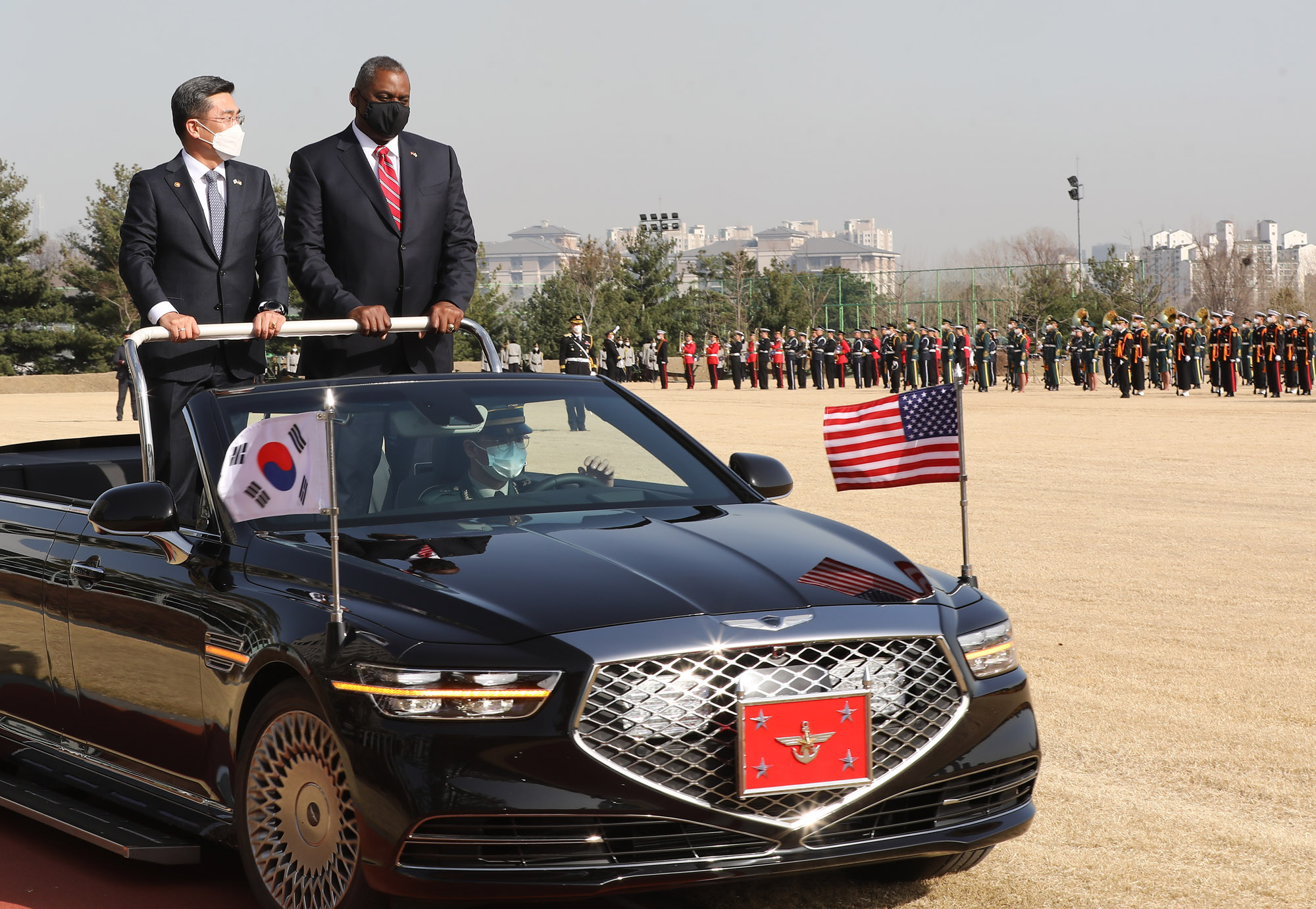 PHOTO: SEOUL, SOUTH KOREA: US Secretary of Defense Lloyd Austin (R) talks with South Korean Minister of Defense Suh Wook as they inspect an honor guard during a welcome ceremony at the Ministry of National Defense on March 17, 2021 in Seoul, South Korea. 