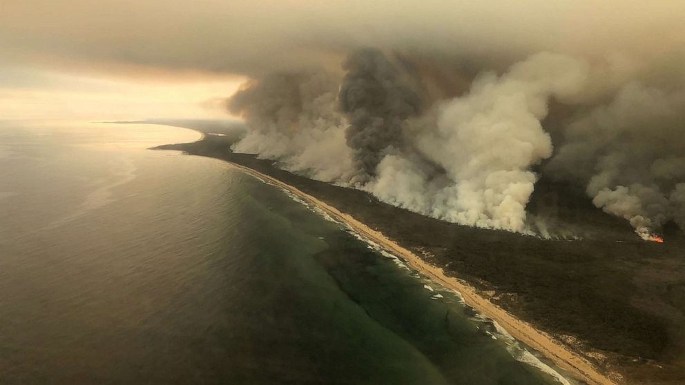 PHOTO: Thick plumes of smoke rise from bushfires at the coast of East Gippsland, Victoria, Australia, Jan. 4, 2020.
