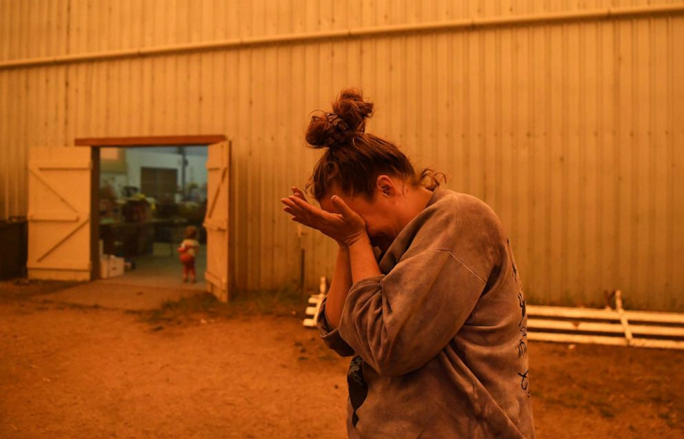PHOTO: Jesse Collins who organizes donations at an evacuation center in Cobargo, Australia, talks about how hard getting water has been, as bush fires continue in New South Wales, Australia, Jan. 5, 2020.