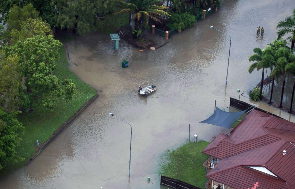 PHOTO: An aerial view shows residents leading a small boat through a flooded street in Townsville, Queensland, Australia, Feb. 4, 2019.