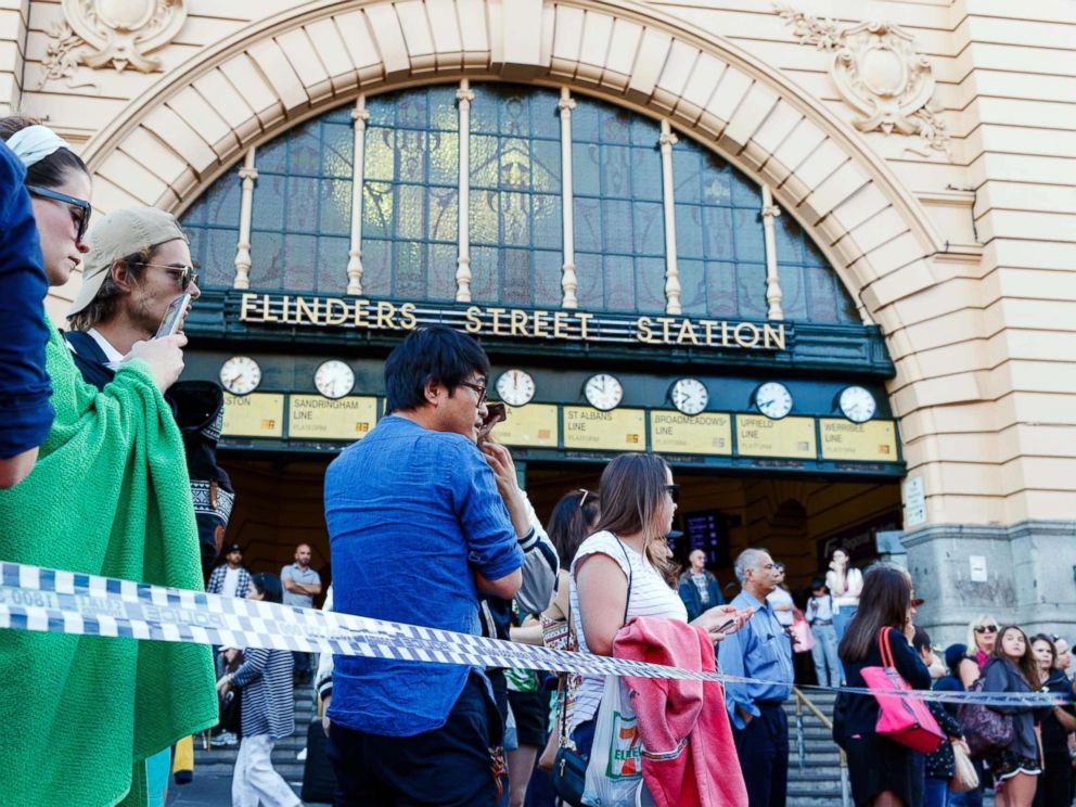 PHOTO: People gather at the scene of where a car ran over pedestrians at Flinders Street in Melbourne, Australia, Dec. 21, 2017. 