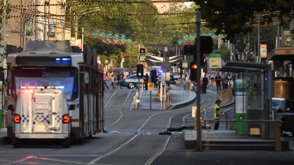 Debris sits in the middle of the road at the scene where a car ran over pedestrians in Melbourne, Australia, Dec. 21, 2017.