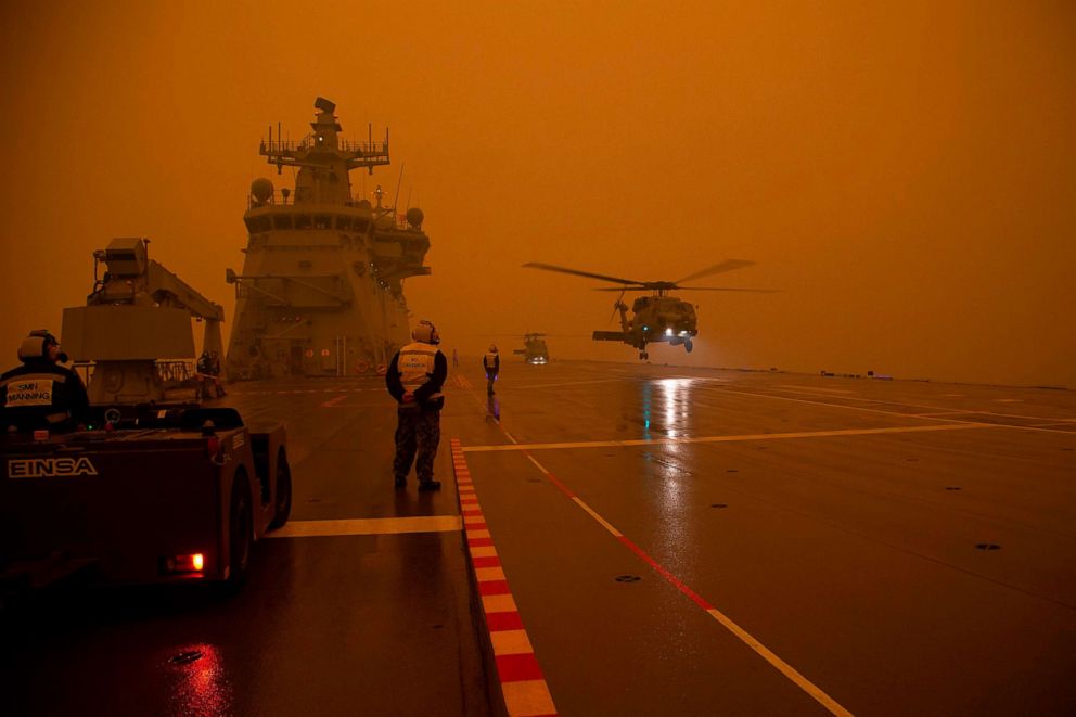 PHOTO: A Royal Australian Navy helicopter departs HMAS Adelaide as part of bushfire relief operations, Jan. 5, 2020.