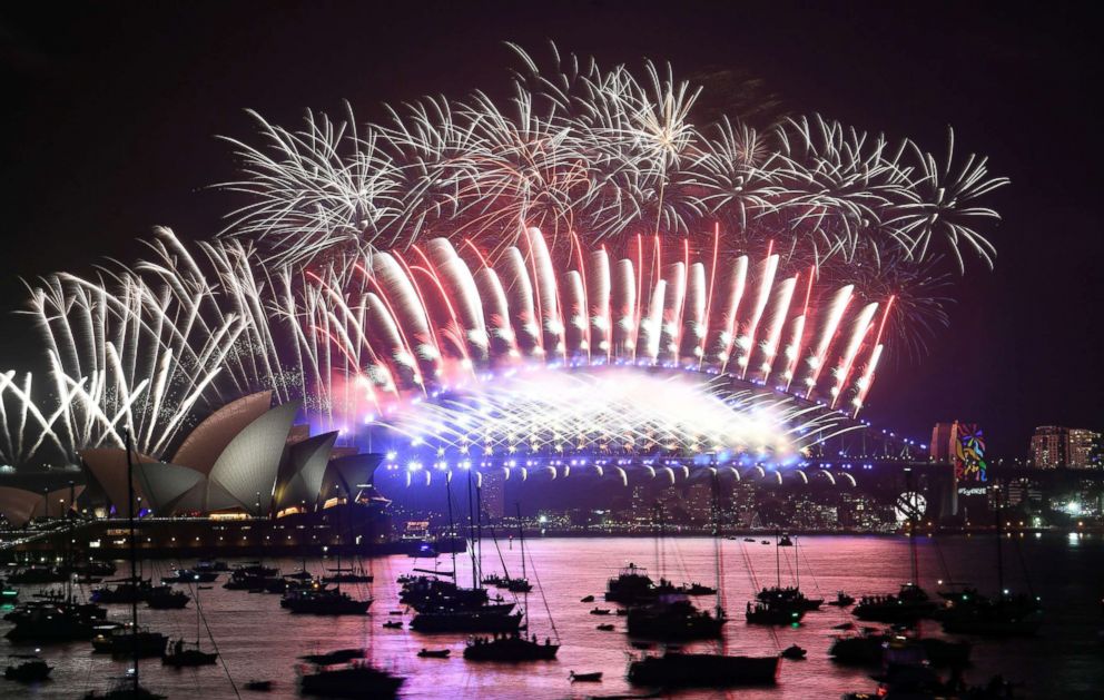 PHOTO: Fireworks light the sky over the Opera House and Harbor Bridge during New Year's Eve celebrations in Sydney, Jan. 1, 2018.