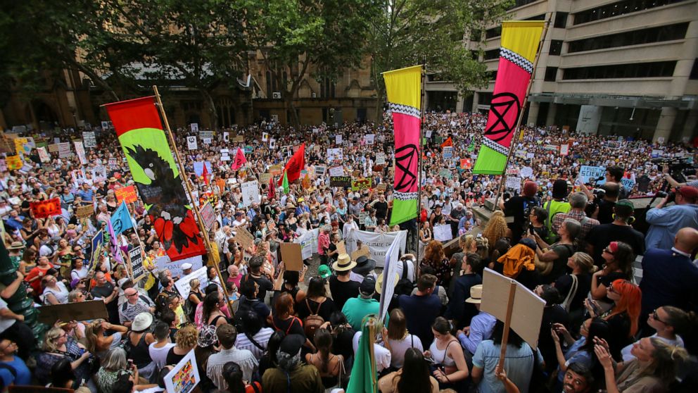 PHOTO: Protesters hold posters during a climate change rally in Sydney, Jan. 10, 2020.
