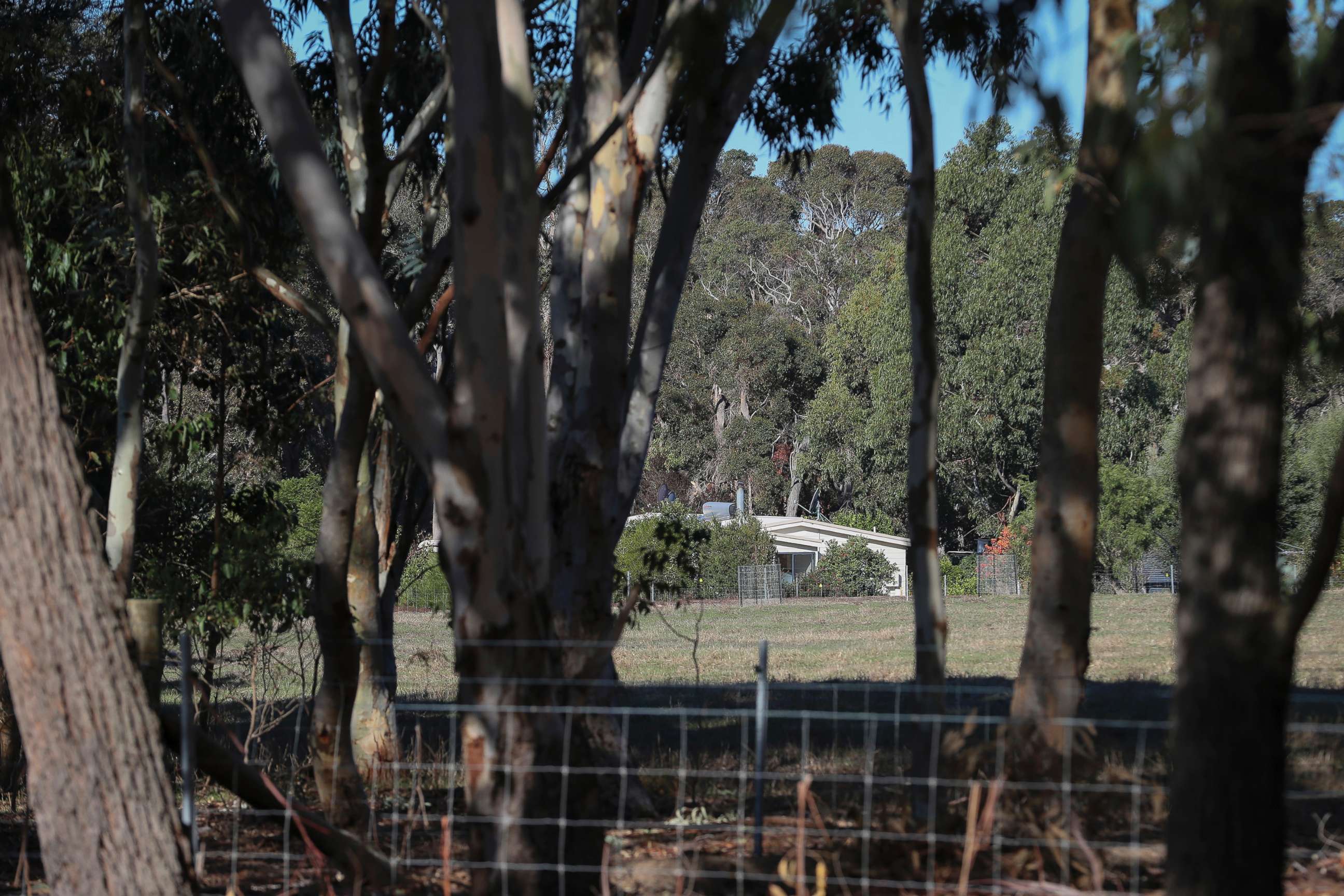 PHOTO: A property is seen from a police roadblock where police are investigating the death of seven people in a suspected murder-suicide in Osmington, east of Margaret River in Australia, May 11, 2018.
