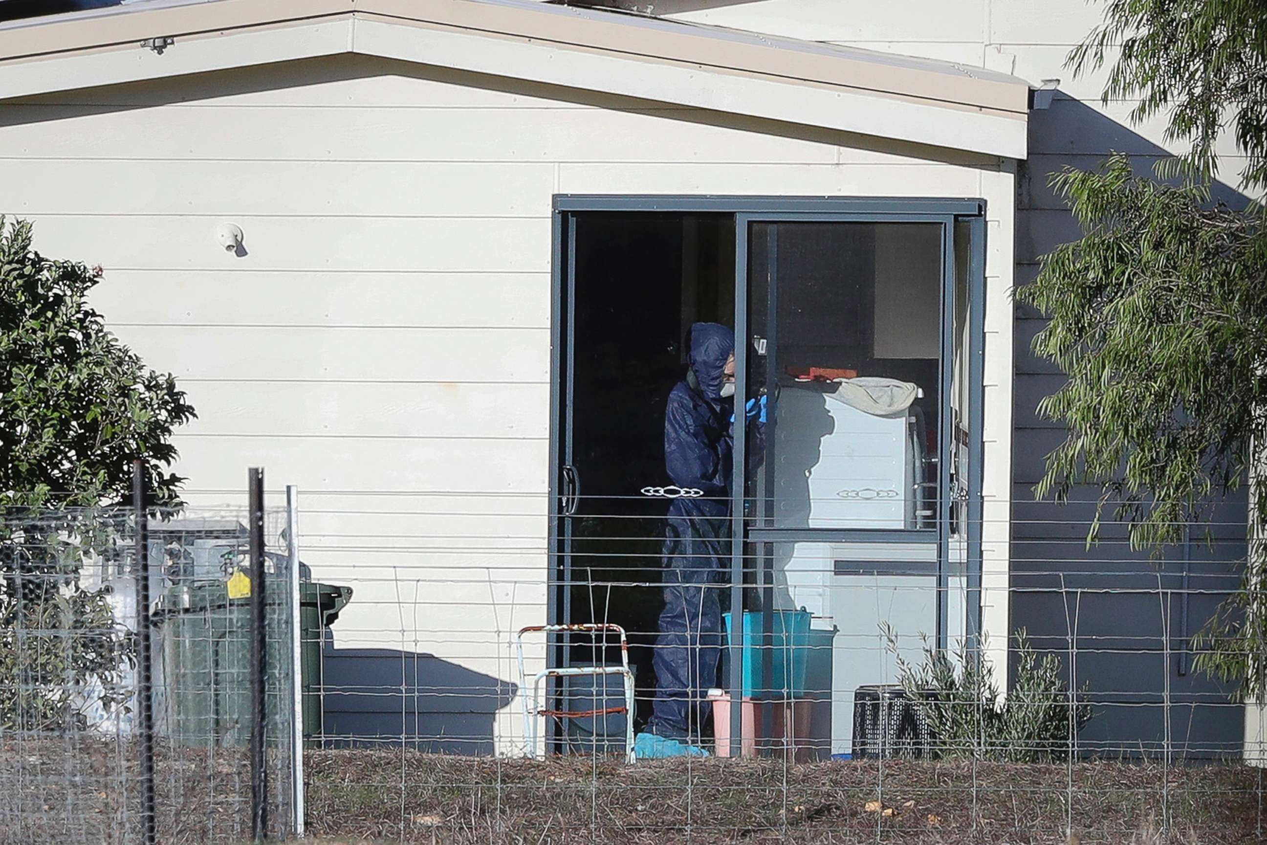 PHOTO: Police forensics investigate the death of seven people in a suspected murder-suicide in Osmington, east of Margaret River, Australia, May 11, 2018.